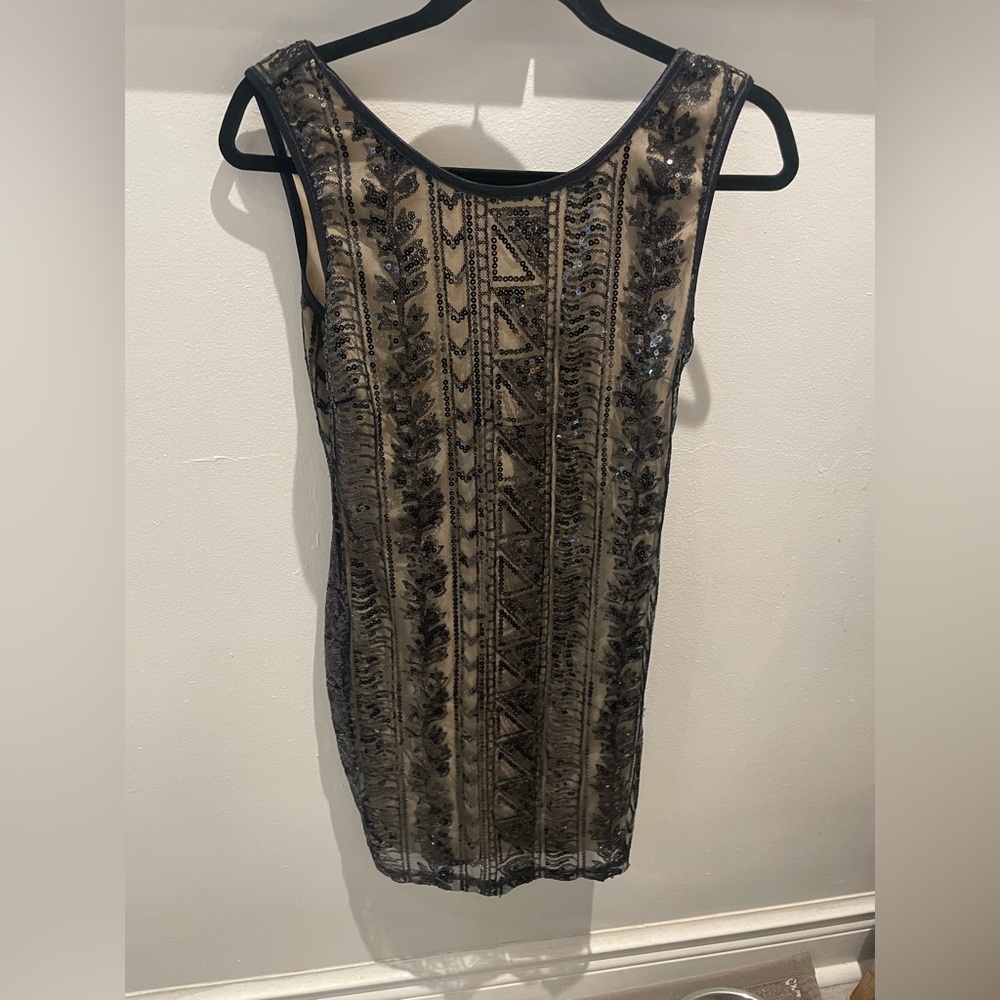 Black and cream sequin dress